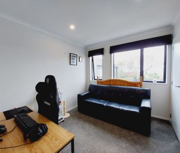 Stylish 2-Bedroom Home with Modern Comforts & Private Outdoor Spaces - Photo 1