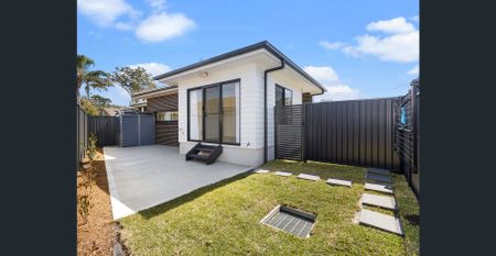 Stylish Near-New 2-Bedroom Home with Spacious Outdoor Living - Photo 4