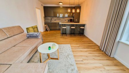 Dwa pokoje z 2 miejscami postojowymi i balkonem - Фото 2