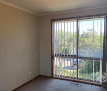 NEAT UNIT IN A CONVENIENT LOCATION! - Photo 2