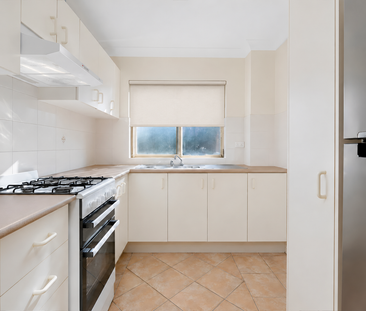 Spacious Two-Bedroom Apartment with Balcony & Two Car Spaces - Photo 2