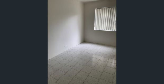 Spacious & Well-Maintained 2-Bedroom Unit in a Convenient Location - Photo 1