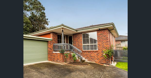 Tastefully renovated unit at the rear of the block - Photo 1