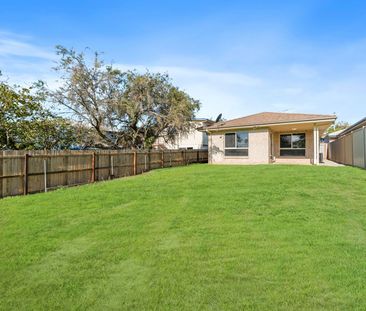 Coastal Comfort Awaits: Your Modern Haven in Woody Point - Photo 1