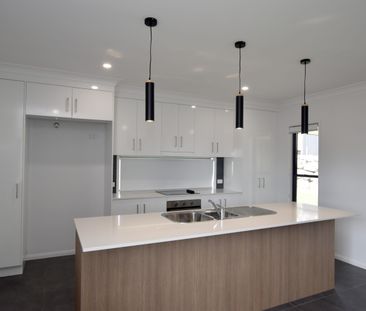 MODERN FOUR BEDROOM HOME IN THE HEART OF RIVERSTONE RISE - Photo 6