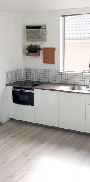 MODERN STUDIO WITH DISTRICT OUTLOOK - Photo 1