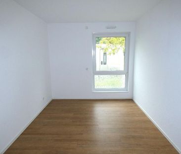 Modern geschnittene 3-Zimmer-Erdgeschoss-Wohnung mit Einbauküche un... - Foto 1