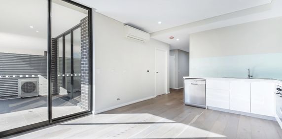 Modern two bedroom unit - 20% below market rent - Photo 2