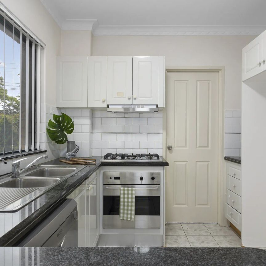 Easy-care living close to endless amenities - Photo 1