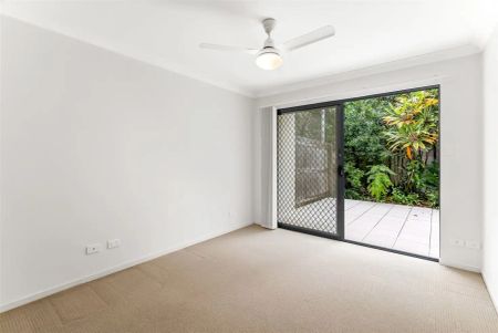 “Suave Villa-Style Townhouse” - Photo 2