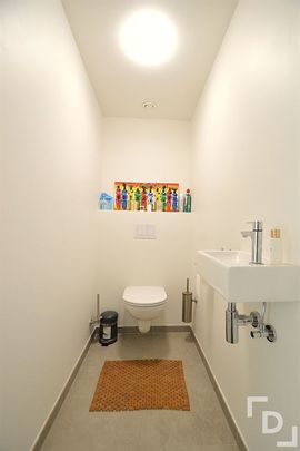 Nieuwbouwappartement met 2 slaapkamers en carport te Ieper - Photo 1