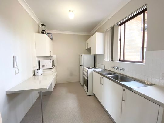 Spacious & Conveniently Located Ground Floor Unit - Photo 1
