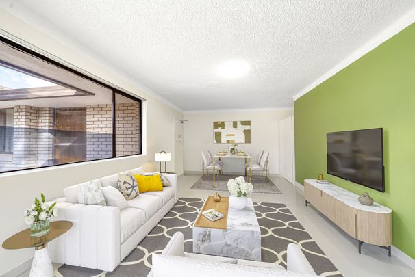 Updated Double Brick 2 Bedroom Unit in Prime Location - Photo 1