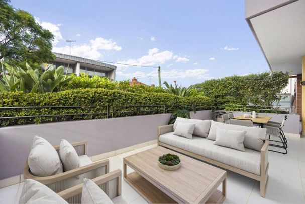IMMACULATE OVERSIZED GARDEN APARTMENT IN TRANQUIL SETTING - Photo 1