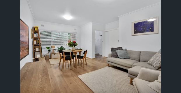 This generously sized two bedroom apartment offers low-maintenance living. - Photo 1