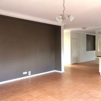 Low Maintenance Four Bedroom, Two Living Area Home! - Photo 1