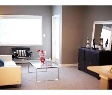 Executive condo in Millrise - 2 bed, 2 full bath, U/G parking/stora... - Photo 1