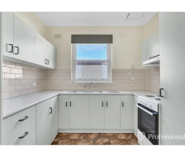 Delightful Family Home Offering Space, Comfort & Low-Maintenance Li... - Photo 6