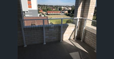 Modern 2-Bedroom Apartment with Parking in Convenient Lidcombe Location - Photo 4