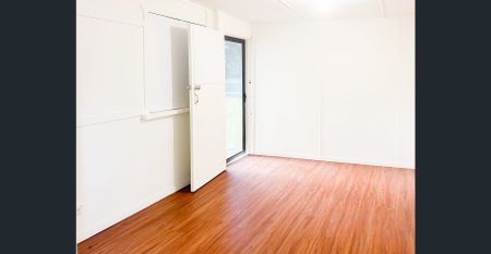 Comfortable 2-Bedroom Home Close to Shops and Transport - Photo 3