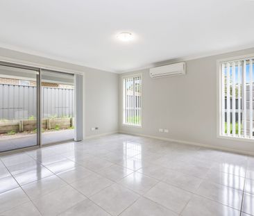 Freshly Painted Three Bedroom Family Home - Photo 2