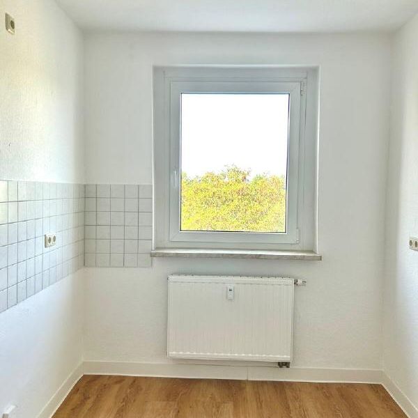 Schmucke Dreiraumwohnung mit Balkon in Weida! - Photo 1