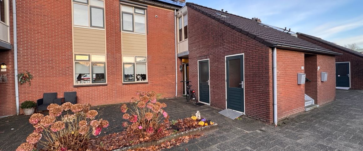 Begane grond appartement met tuin - Photo 1