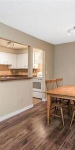 Spacious 2 Bedroom Top Floor Corner Condo with own Parking - Photo 4