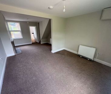 A well-presented two-bedroom home with neutral décor and village se... - Photo 2