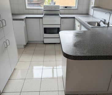 Freshly painted, Easy-Living Unit at the Rear of the Block - Photo 2