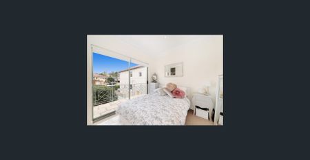 Freshly Painted 2-Bedroom Townhouse in a Prime Coastal Location - Photo 3