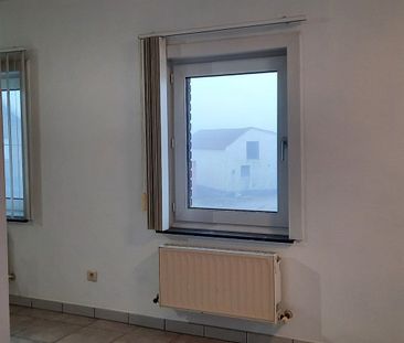 Verzorgd 1-slaapkamerappartement met parkeerplaats te Neeroeteren. - Photo 6