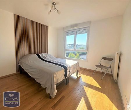 Appartement à louer 4 pièces 77m² - Photo 2