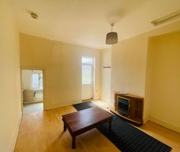 Spacious first floor flat with private entrance into living room, s... - Photo 1