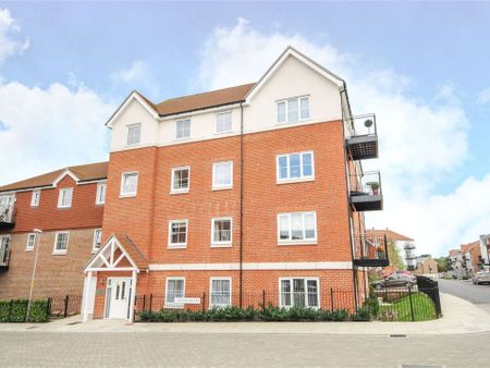 A contemporary ground floor apartment set in a popular development - Photo 2