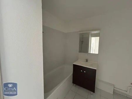 Appartement à louer 4 pièces 74m² - Photo 2