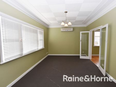 CENTRAL LOCATED UPDATED BRICK HOME - Photo 2