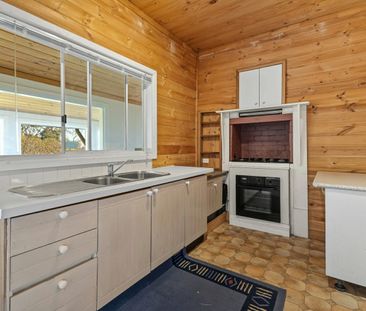 Character Filled 3 Bedroom Home with Warm Timber Features - Photo 6