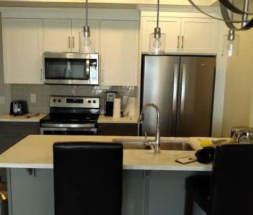 AVAILABLE November 2024: EXECUTIVE FURNISHED: SETON -SHOWS NICE | 19621 40 Street SE, Calgary, AB T3M 3B2, Calgary - Photo 1