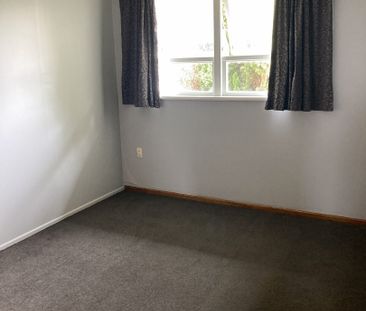 This two-bedroom unit offers comfortable, low-maintenance living in... - Photo 1