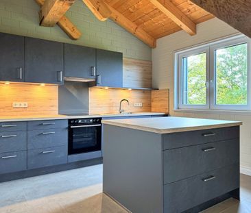 Erstbezug: Extravagante Dachgeschosswohnung mit Einbauküche und Log... - Photo 2