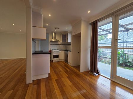 Freshly Painted, Perfectly Positioned Three Bedroom! - Photo 3