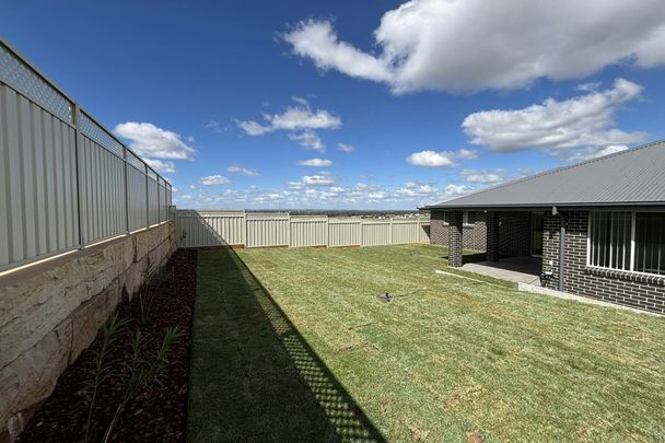 BRAND NEW FOUR BEDROOM FAMILY HOME - Photo 1