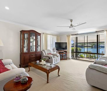 Waterfront Family Home with Pool & Triple Garage - Photo 1