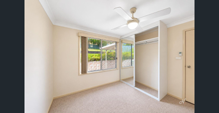 NEAT 3 BEDROOM HOME IN A QUIET WOODRISING CUL-DE-SAC - Photo 3