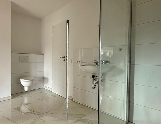 Charmante 2-Zimmer-Wohnung mit Balkon und PKW-Stellplatz in Zwingenberg Rodau - Foto 1