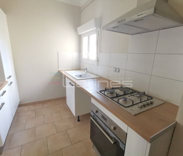 Location Appartement 2 pièces 49m² NIMES 30000 - Photo 2
