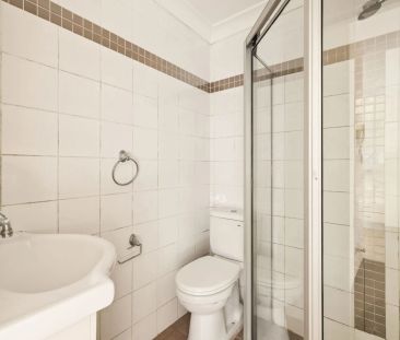 Spacious Top-Floor Apartment with Stunning Views | Dual-Level - Photo 6