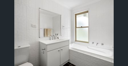 Stylish Family Home in a Convenient Village Setting - Photo 5