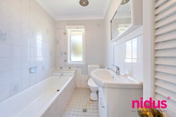 “Neat & Spacious 3-Bedroom Home with Ample Parking on a Generous Block” - Photo 1